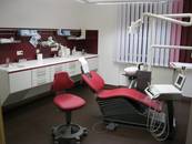 Behandlungszimmer in Violett neu gestaltet durch Teppich Hopf Raumgestaltung Hof